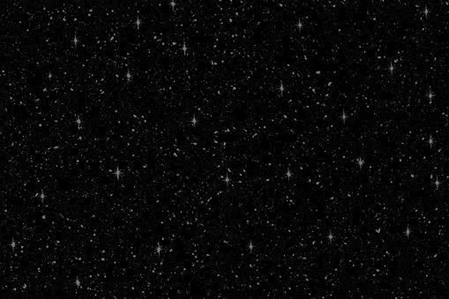 a black background with a lot of white stars on it
