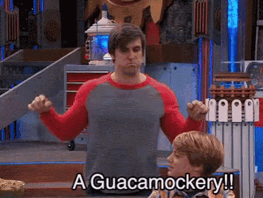 a man says a guacamockery while standing next to another man