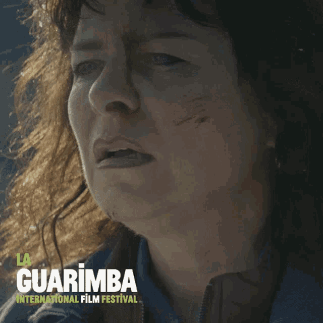 a poster for the guarimba international film festival features a woman crying