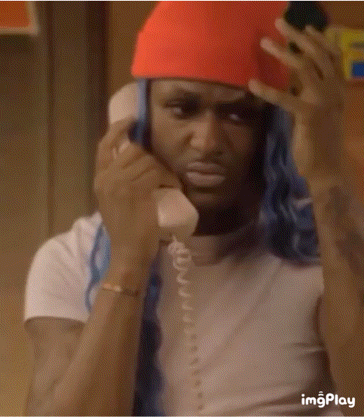 a man wearing a red hat is talking on a telephone with the words well did you see him behind him
