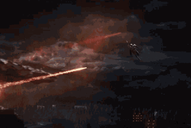 a person is holding a sword in a smokey area