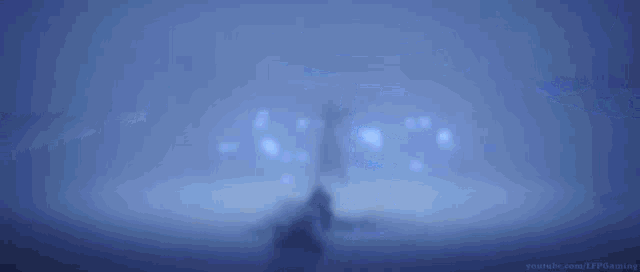 a man in a hood is standing next to a woman in a hood in a dark room in a video game .
