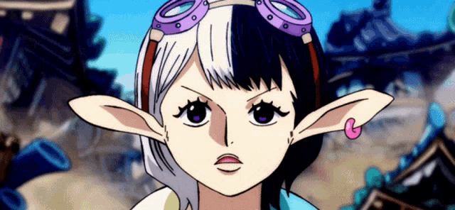 a girl with elf ears and goggles on her head looks angry