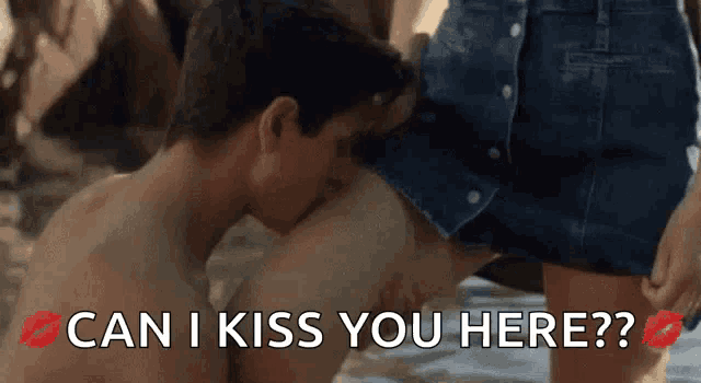 a man kissing a woman 's leg with the words " can i kiss you here "