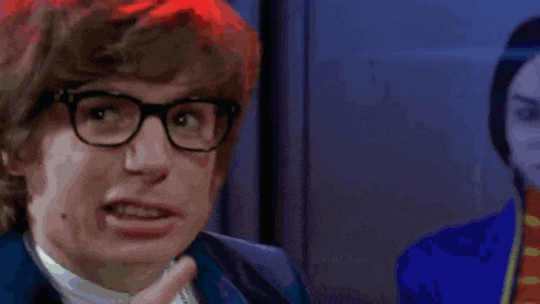 a man in glasses says austin powers i ve got an idea