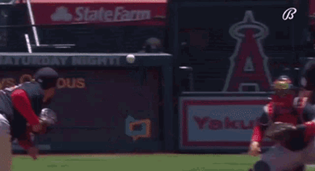 a baseball player with the number 29 on his jersey is at bat