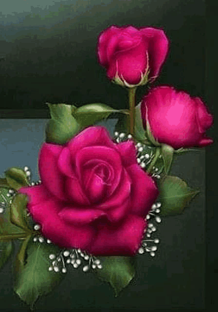 a bunch of pink roses with green leaves are sitting on a table .