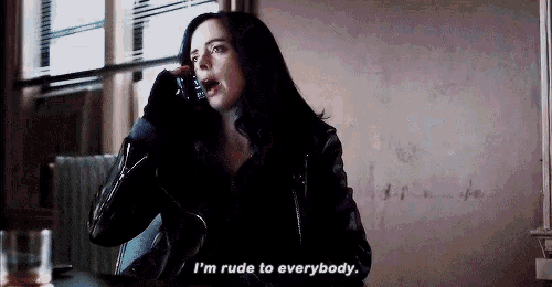 a woman in a leather jacket is talking on a cell phone and saying i 'm rude to everybody .