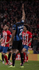 a soccer player with the number 2 on his back celebrates a goal