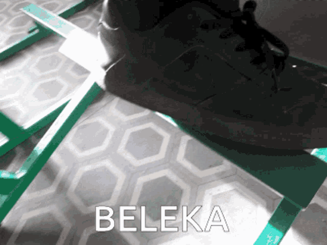 a picture of a person 's foot with the word beleka on the bottom right