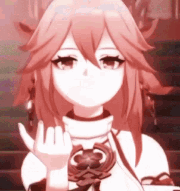 a close up of a pink haired anime girl giving the middle finger .