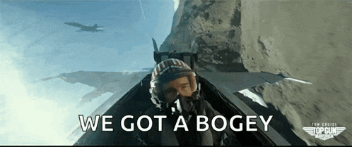 a man in a fighter jet with the words we got a bogey above him