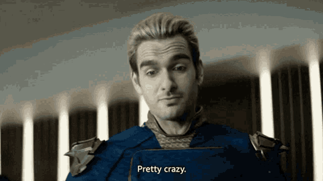 a man in a blue suit says pretty crazy