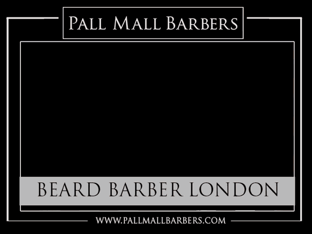 a man is getting his beard shaved by pall mall barbers
