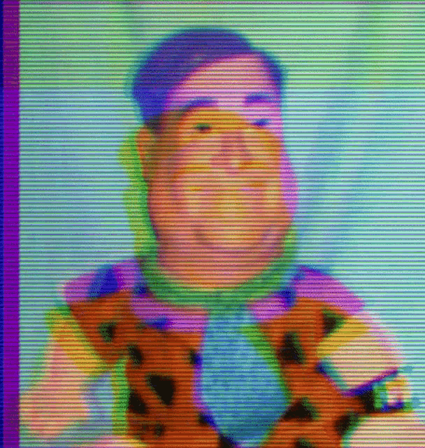a blurred image of a man in a flintstone costume on a television screen .