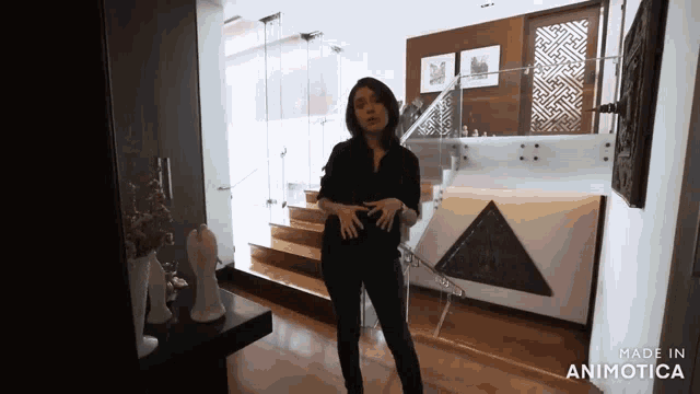 a woman is standing in front of a glass staircase made in animotica