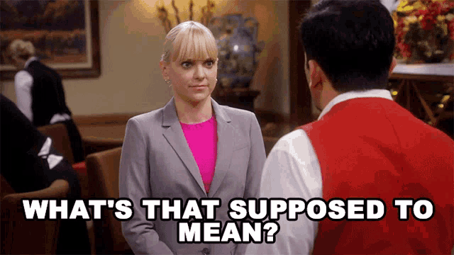 a woman talking to a man with the words what 's that supposed to mean written above her