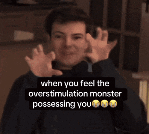 a man making a funny face with the caption when you feel the over stimulation monster possessing you