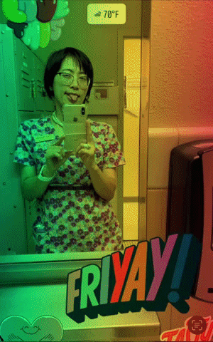a woman taking a selfie in front of a mirror that says friday on it