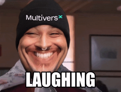 a man wearing a beanie with the word multivers on it