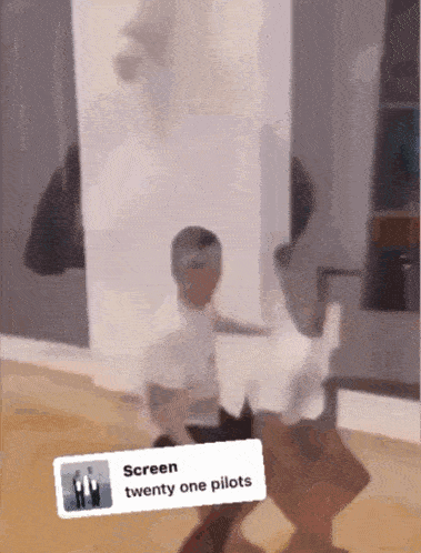 a twenty one pilots song is being played on the screen