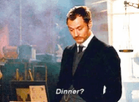 a man in a suit and tie says " dinner "
