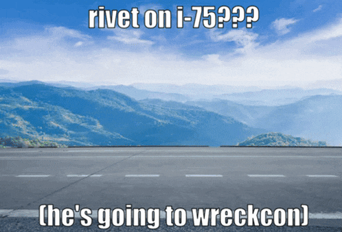 a road with mountains in the background and the words rivet on i-75??