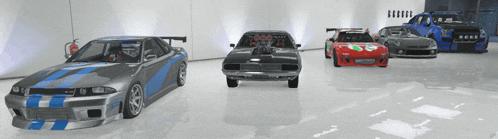 a row of cars are parked in a room with a fire extinguisher