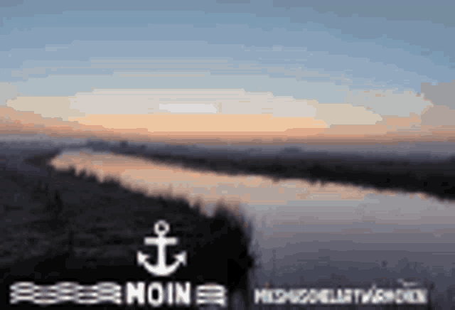 a picture of a river with an anchor in the middle of it