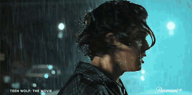 a poster for teen wolf shows a person in the rain