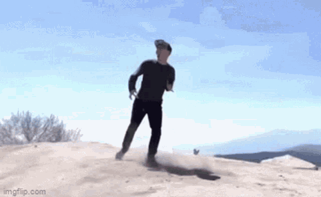 a man standing on a dirt road with a watermark that says imgflip.com on the bottom
