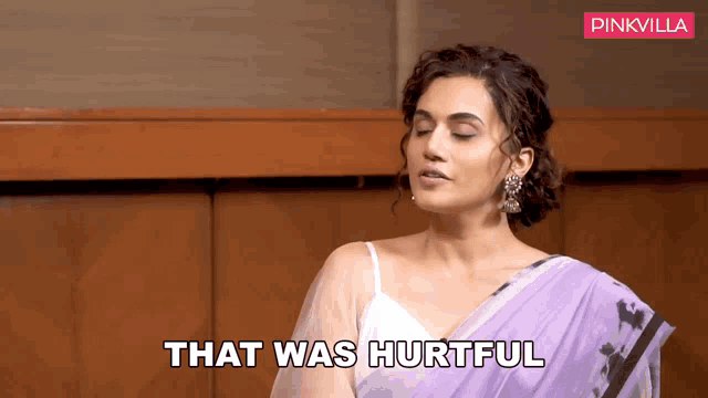 a woman wearing a purple saree says that was hurtful