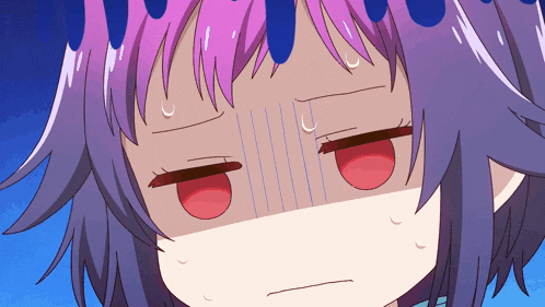 a close up of a girl 's face with purple hair