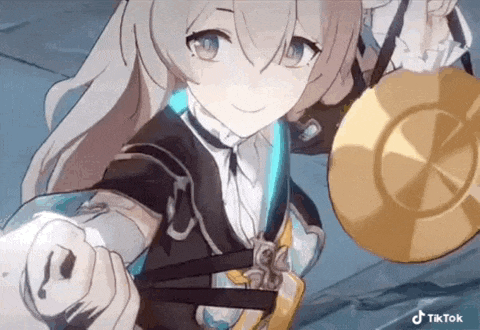 a girl from a video game is holding a gong in her hand .