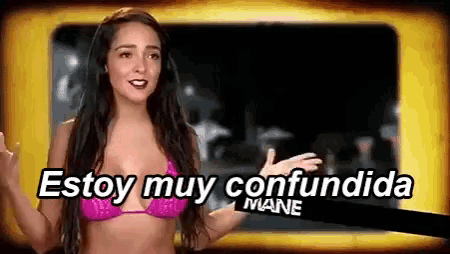 a woman in a bikini is talking in spanish .