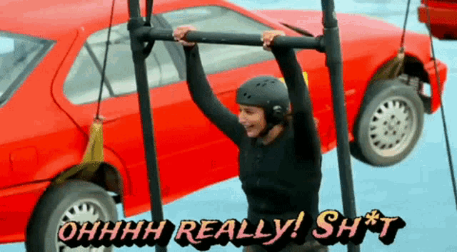 a woman is hanging from a bar with the words " ohhhh really ! sh * t " above her