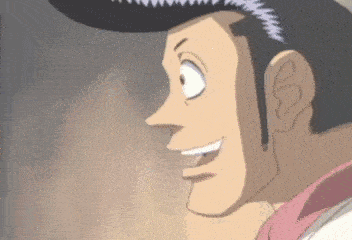 a close up of a man wearing a cowboy hat and smiling .