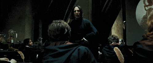 a man talking to another man with the words " then i suggest you take extra care "