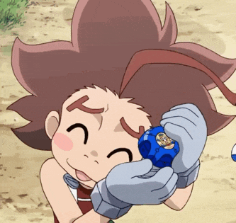 a cartoon character is holding a blue ball with a smiley face on it
