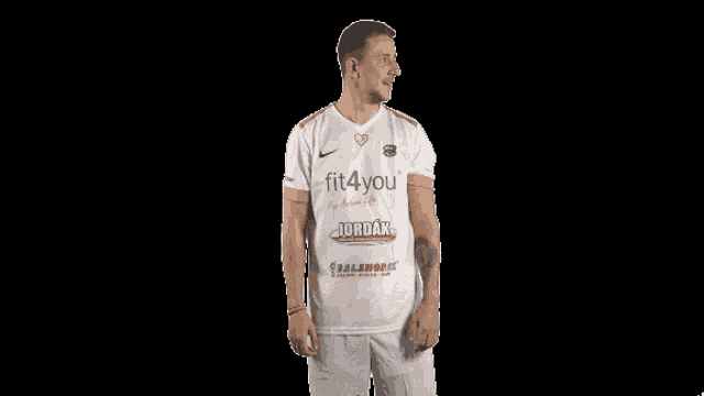 a man wearing a white shirt with fit4you on it