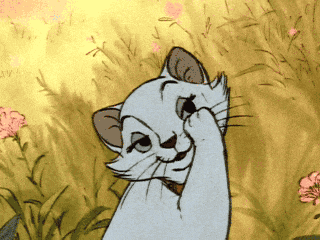 a cartoon cat is scratching its face in a field of tall grass