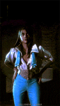 a woman in a white shirt and blue pants is standing with her hands on her hips ..