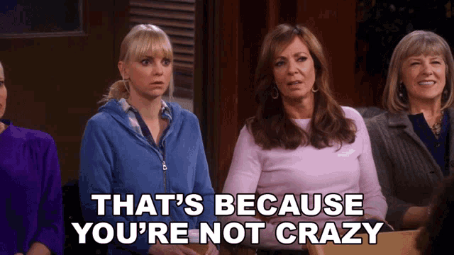 a group of women are sitting in a room with the words that 's because you 're not crazy