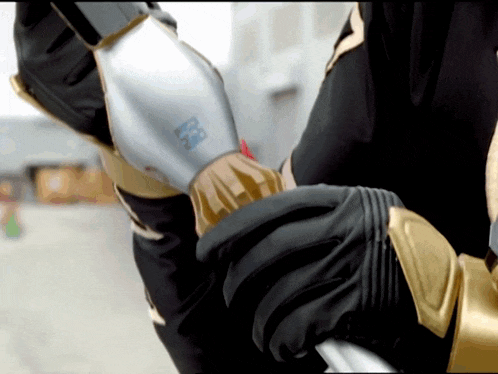 a close up of a person 's arm with a sticker that says ' rm ' on it