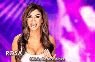 a woman in a white tank top with the name rosa on it