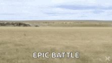 a group of animals are standing in a field with the words epic battle written on the bottom .