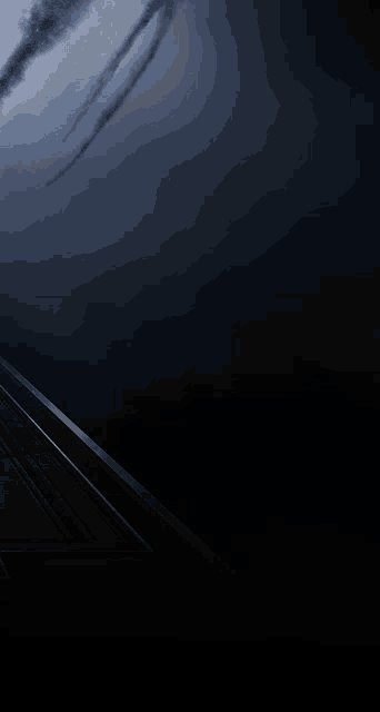 a dark background with a few lines of light on it