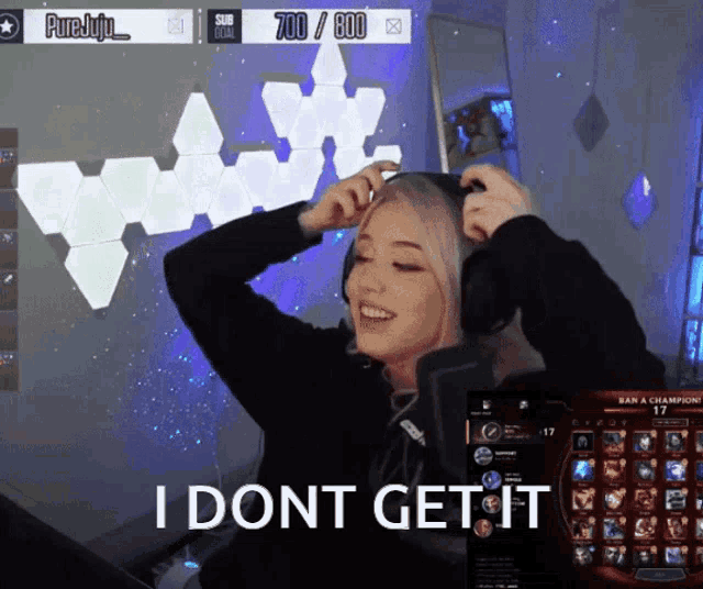a woman wearing headphones says " i dont get it " in front of a screen