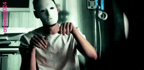 a man wearing a white mask with the number 2024 on the bottom