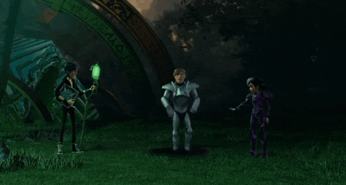 a group of cartoon characters are standing in a field with a green object in the middle